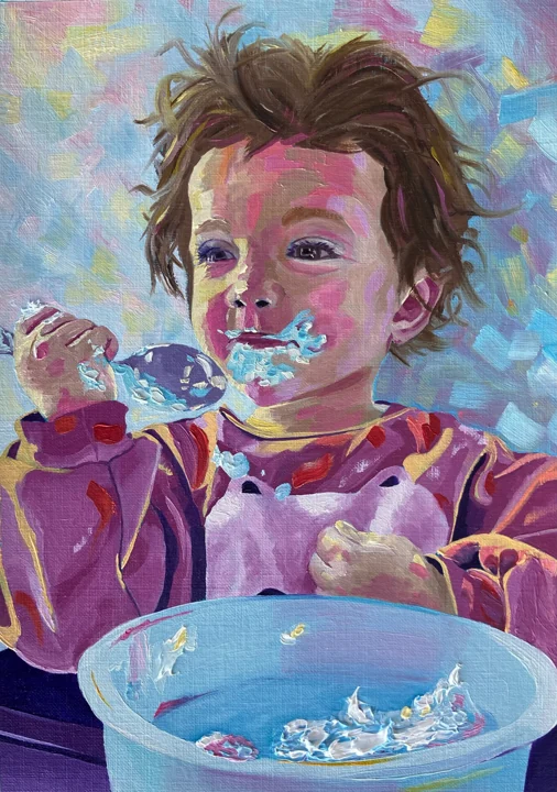 A young girl eating yoghurt, with pink, yellow and blue brushstrokes.
